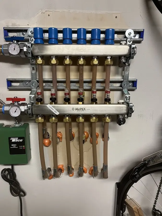 Plumber performing Leak Detection at a residential property in Kill Devil Hills